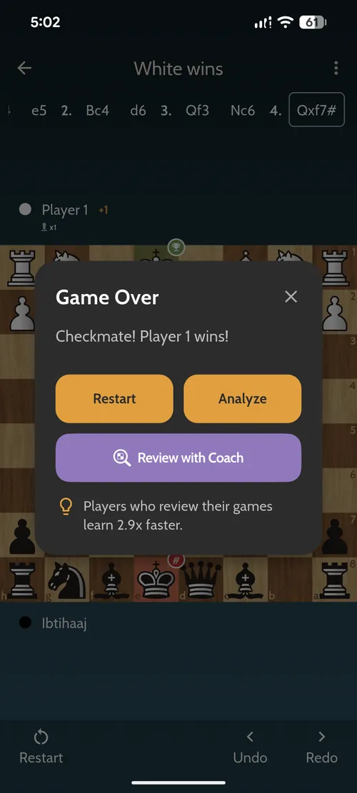 Game-over dialog in Chess Coach Pro with a 'Review with Coach' button after a checkmate